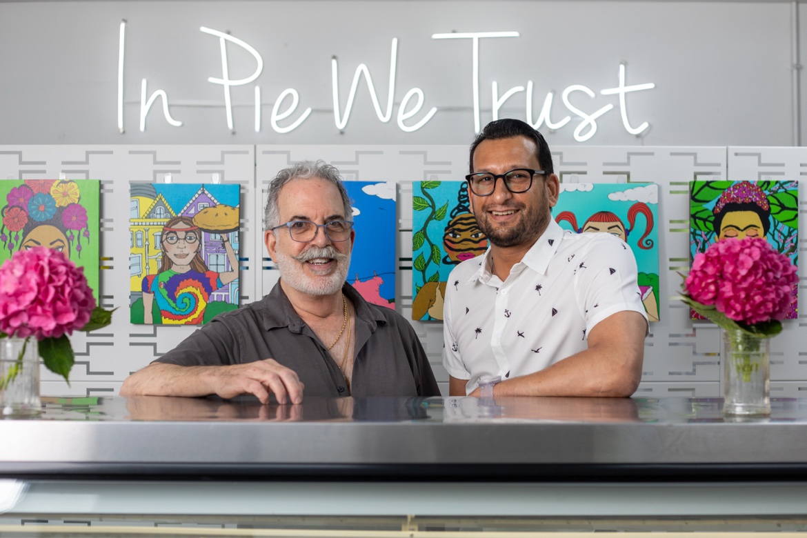 Deon and Oreste behind the counter at The Sweet & Savory Pie Company